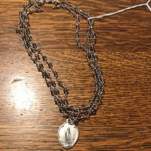 Unique tripe strand silver necklace with Mary medal